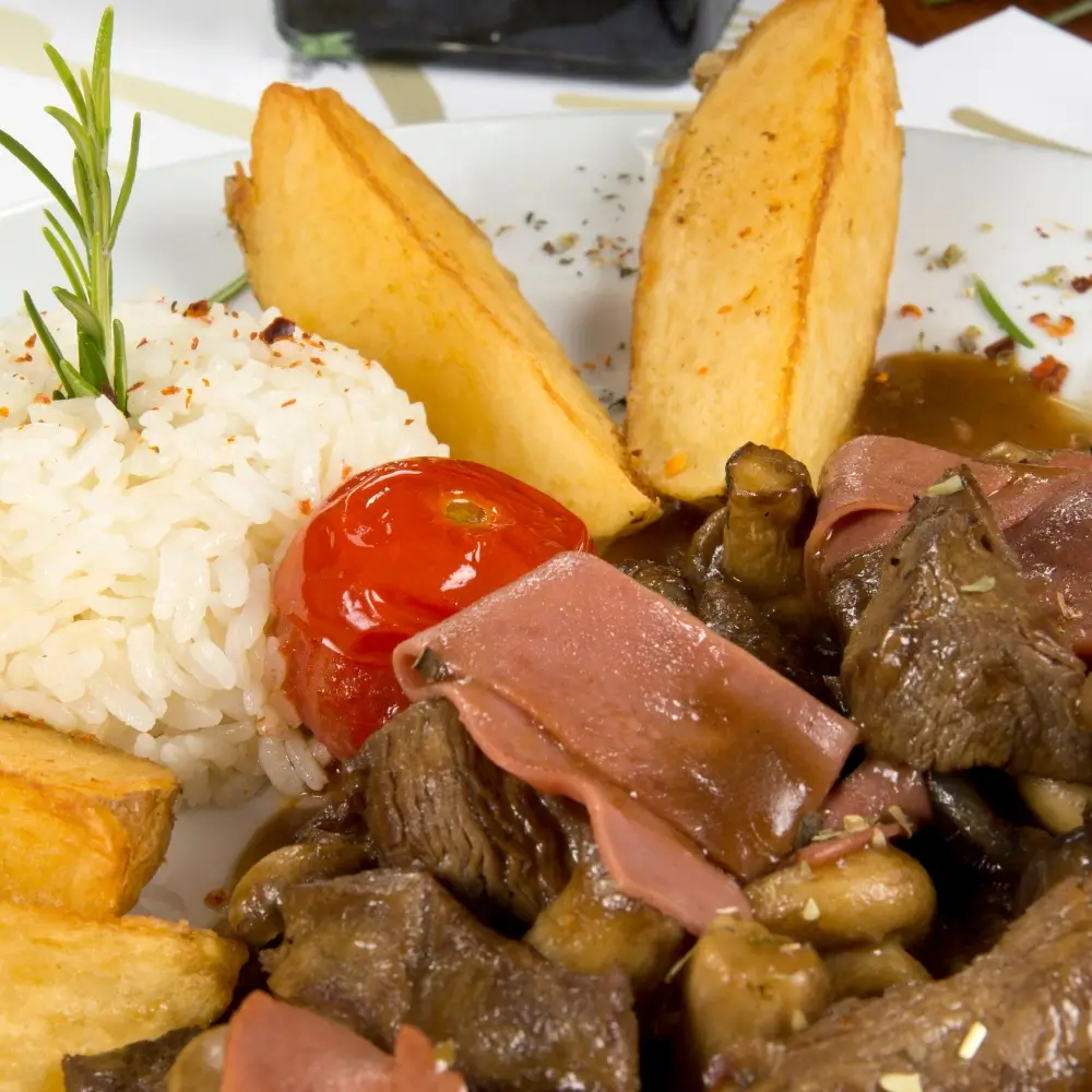 A hearty bowl of beef bourguignon, rich with tender beef, vegetables, and a flavorful sauce.