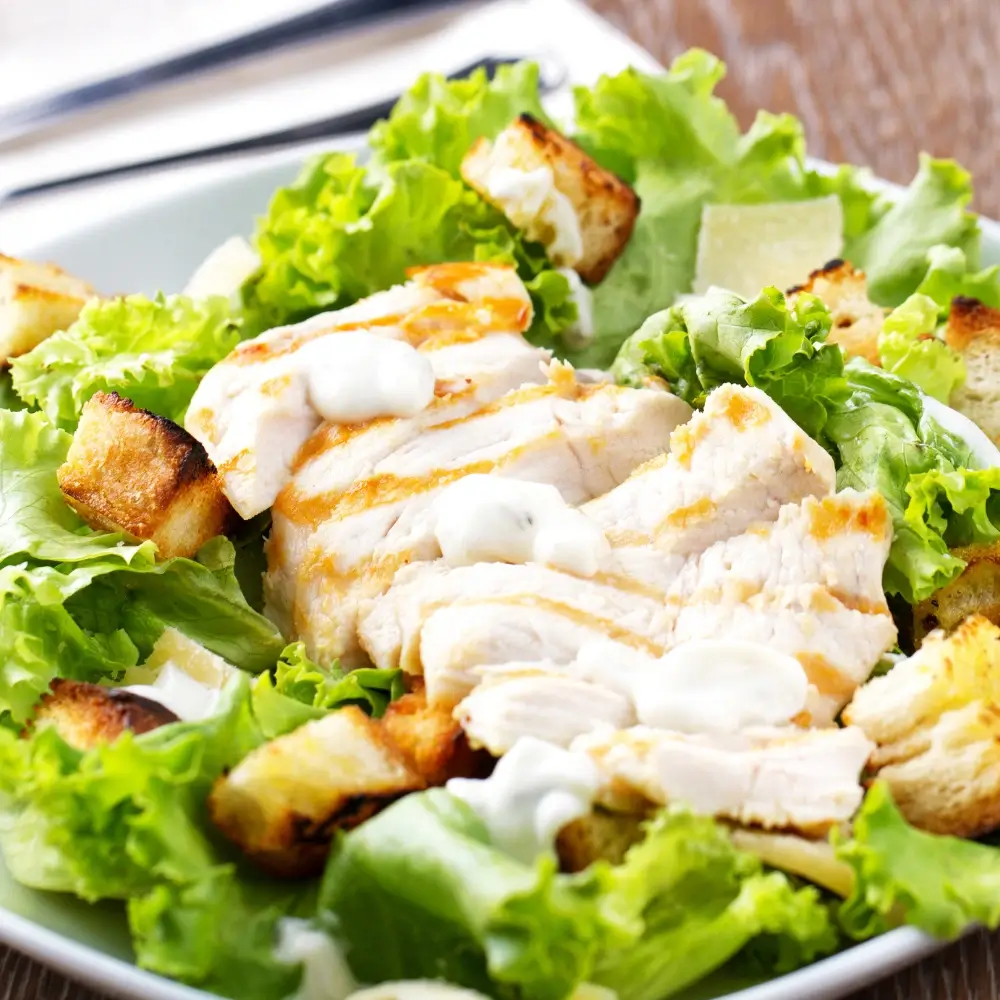 Caesar Salad Recipe: A classic, fresh salad with crisp romaine lettuce, crunchy croutons, Parmesan cheese, and a creamy Caesar dressing.