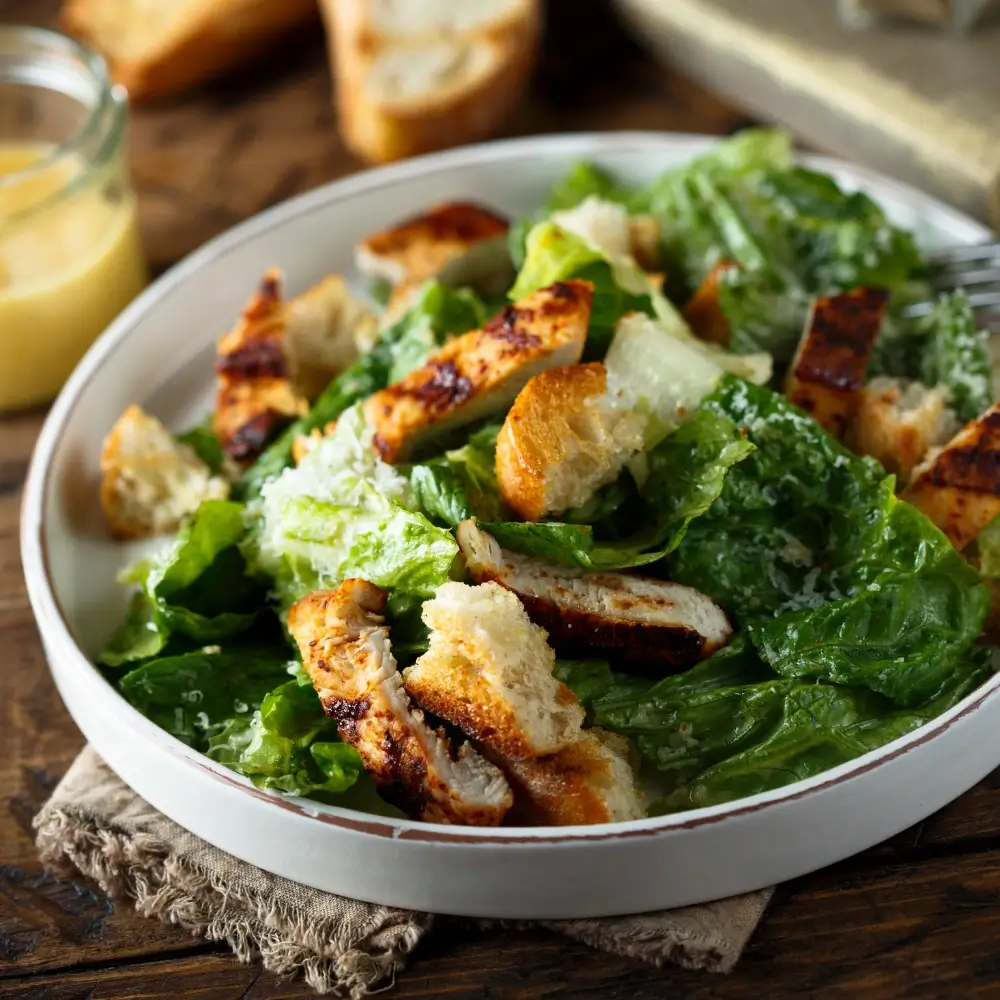 Caesar Salad Recipe: A classic, fresh salad with crisp romaine lettuce, crunchy croutons, Parmesan cheese, and a creamy Caesar dressing.