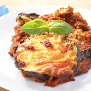 Eggplant Parmesan Recipe: A hearty dish with layers of breaded eggplant, marinara sauce and melted mozzarella cheese, baked to perfection.