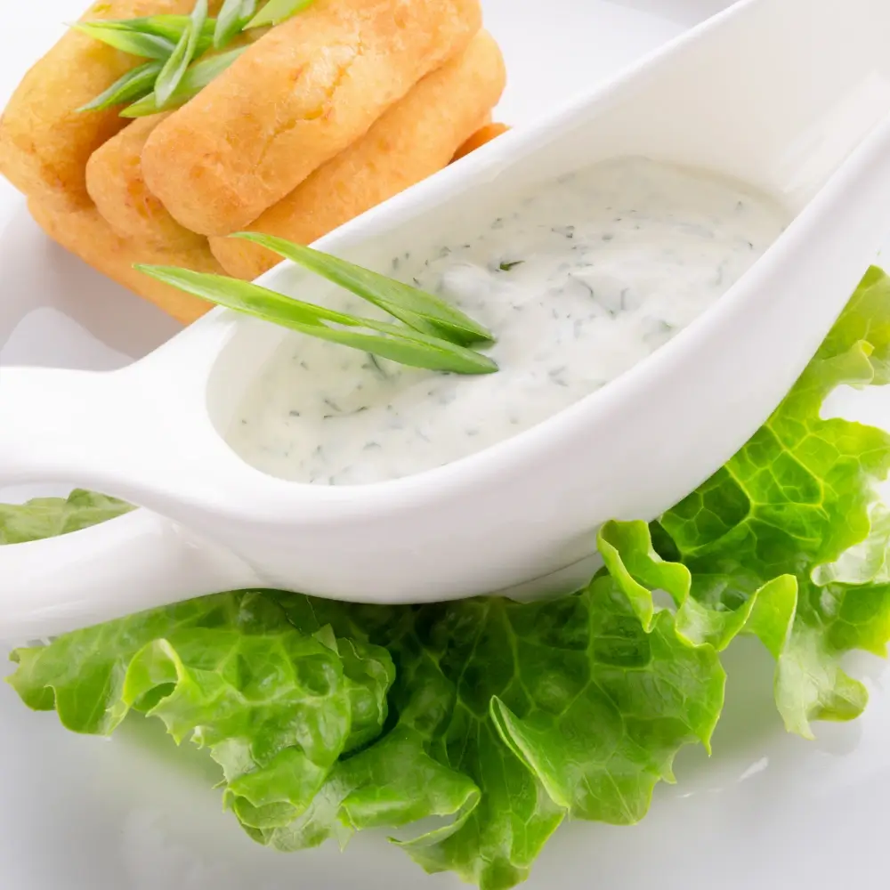 Tartar Sauce Recipe: A creamy bowl of homemade sauce, featuring chopped pickles, fresh herbs, and a tangy, flavorful base.