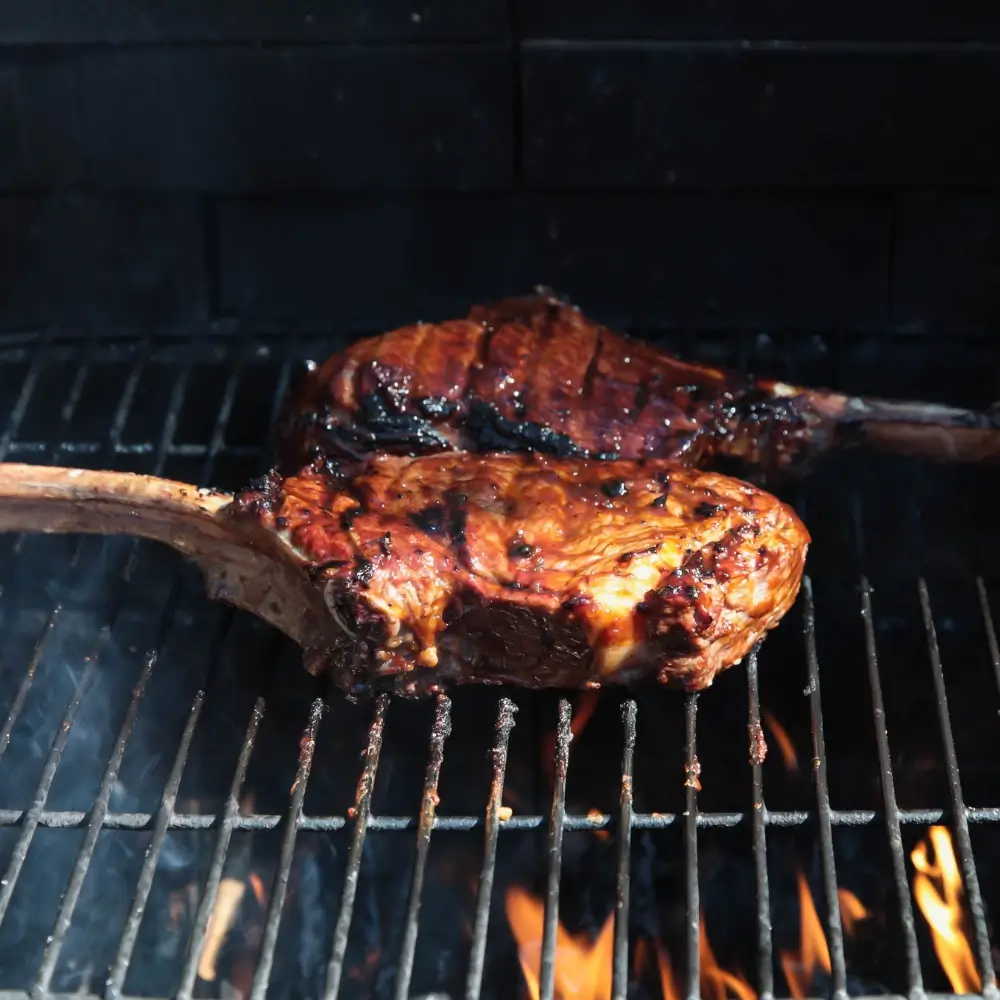 Juicy Tomahawk Steak Recipe grilled to perfection with a rich sear.